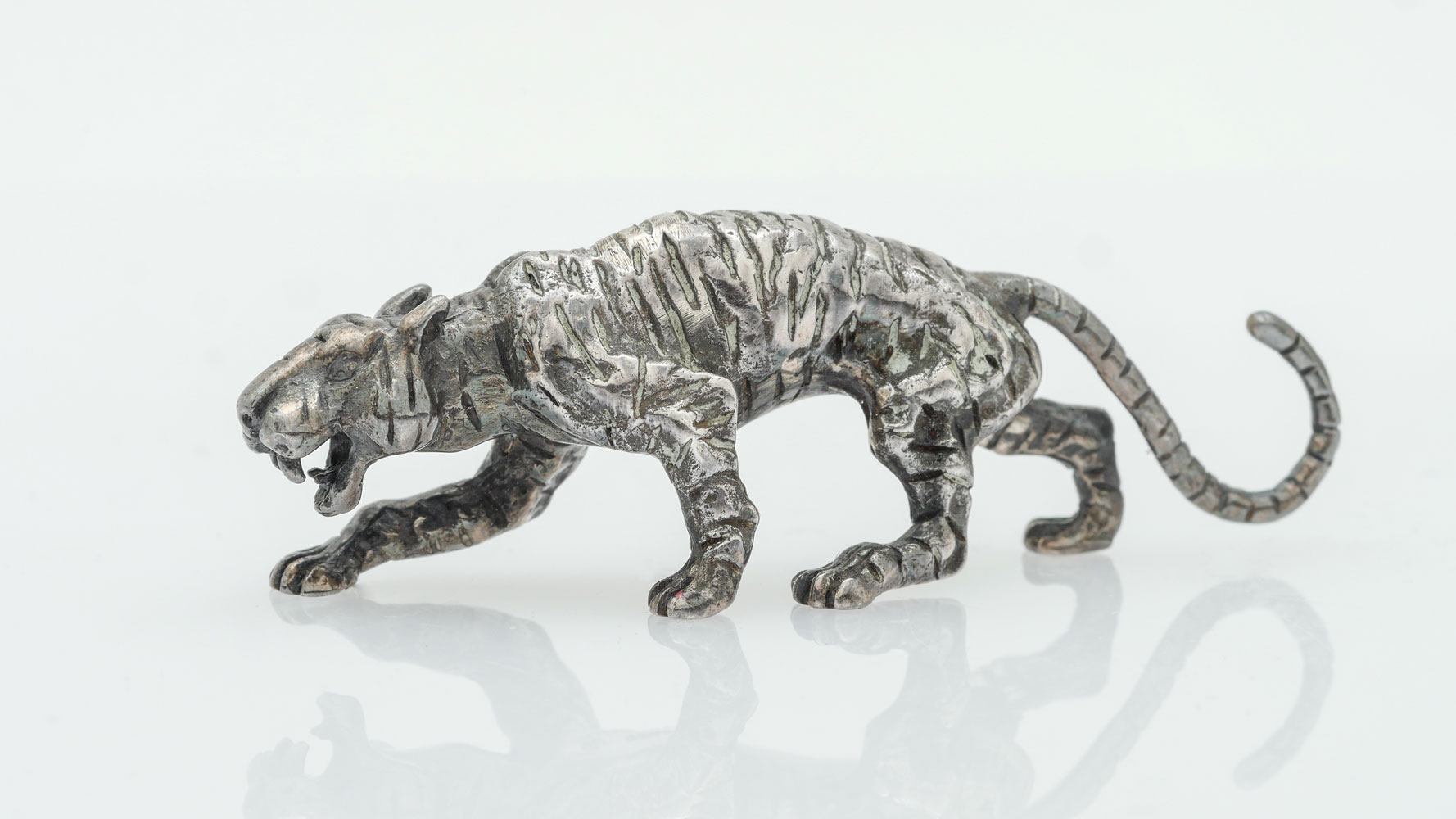 Appraisal: CLASSIC CARTIER STERLING TIGER Exceptional quality tiger figurine has striped