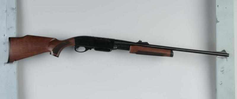 Appraisal: Remington Pump Rifle Description winchester Nice wooden stock and forward