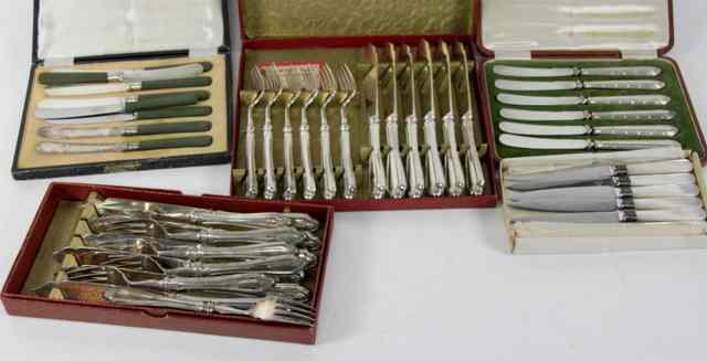 Appraisal: Six dessert knives with mother-of-pearl handles six pairs of fish