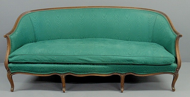 Appraisal: French Provincial style walnut sofa h x l x d