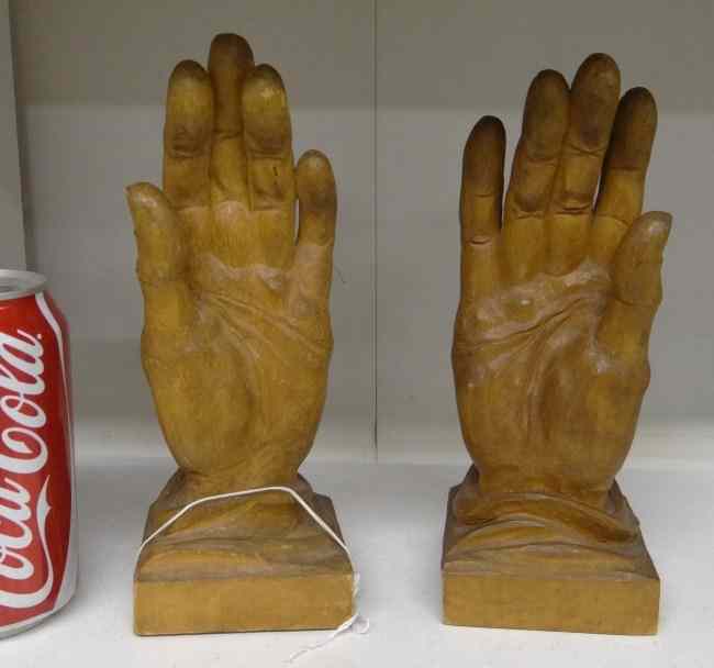 Appraisal: Pair folk art carved wooden hand bookends Marked ''Heinzeller'' ''