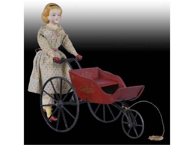 Appraisal: Walking Doll with Carriage Toy Description Manufactured by W M