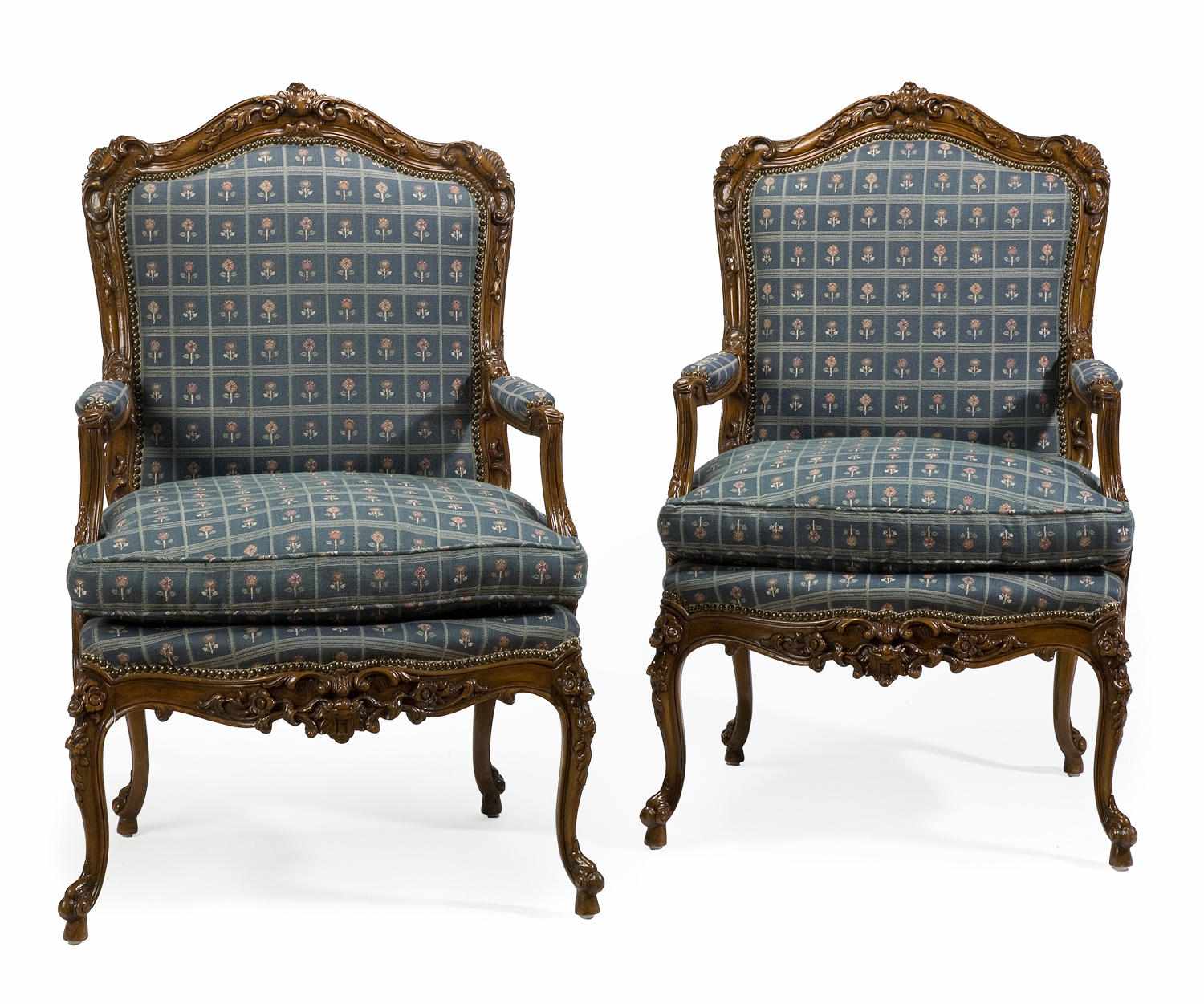 Appraisal: A pair of Louis XV style carved walnut armchairs height