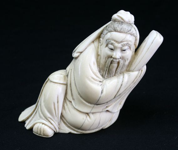 Appraisal: A Chinese ivory carving of a sage cm high