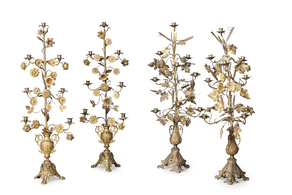 Appraisal: TWO PAIRS OF CONTINENTAL GILT METAL CANDELABRA TH CENTURY one