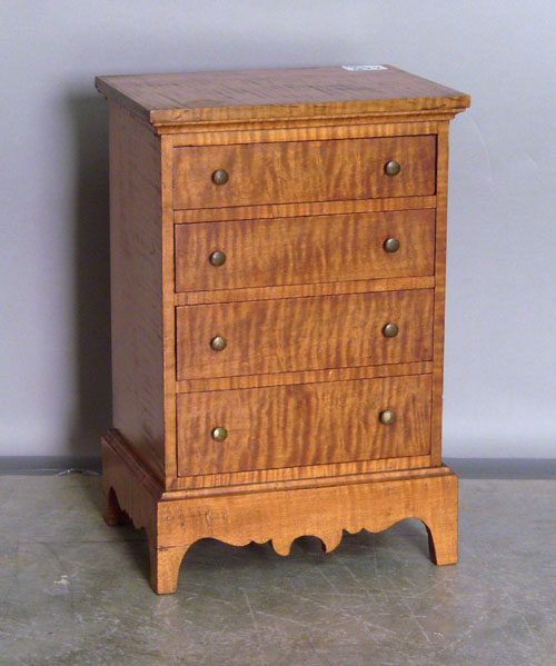 Appraisal: Curly maple miniature chest of drawers Provenance Collection of Richard