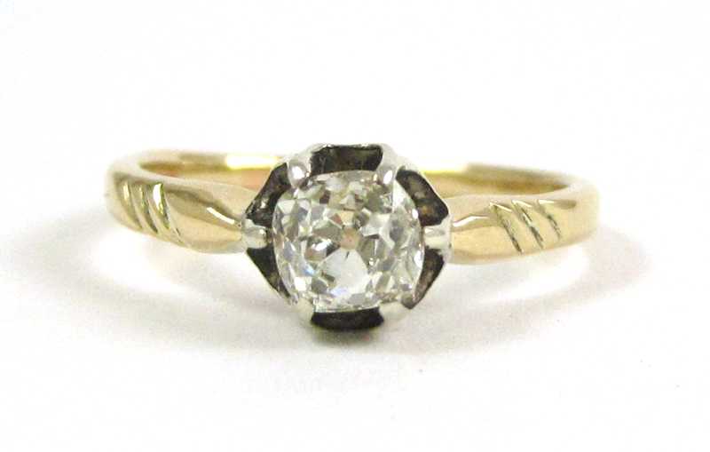 Appraisal: DIAMOND AND FOURTEEN KARAT GOLD SOLITAIRE RING set with a