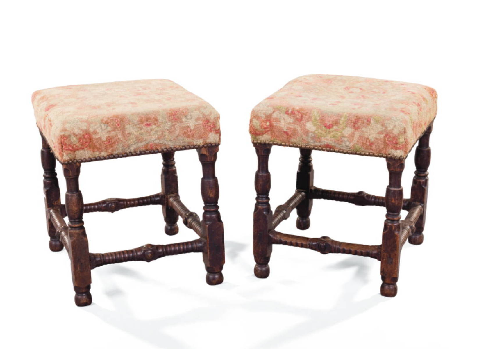 Appraisal: PAIR OF NEEDLEPOINT FOOTSTOOLS WITH RING-TURNED STRETCHER BASE Height inches