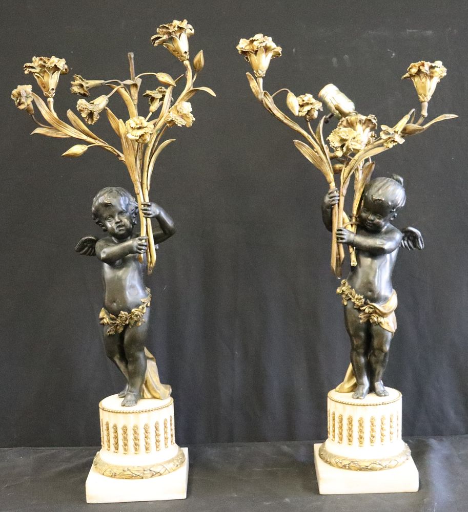 Appraisal: Pair Of Fine Quality Patinated And Gilt Bronze Putti Form