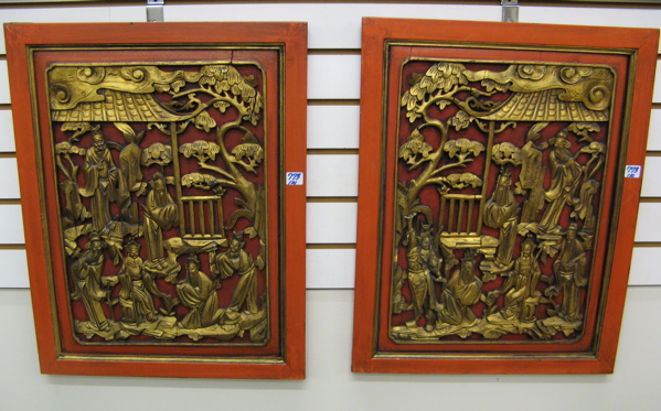 Appraisal: PAIR CHINESE HAND CARVED GILT WOOD WALL PANELS against orange-red