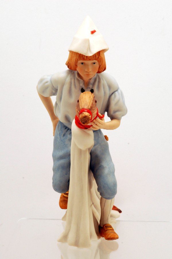 Appraisal: Cybis bisque figurine of boy with sword and feathered hat