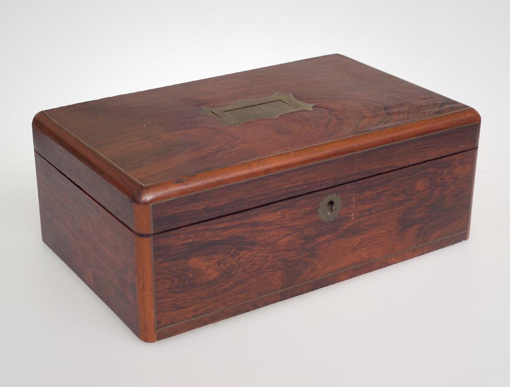 Appraisal: th CENTURY ROSEWOOD JEWELLERY BOX the rectangular hinged lid fitted