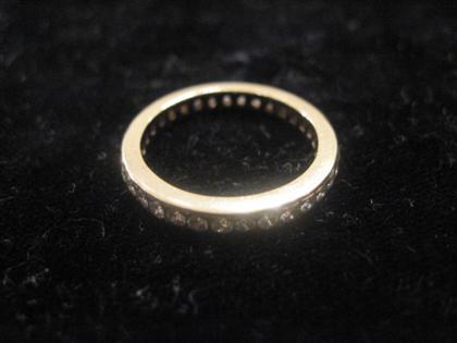 Appraisal: Single karat yellow gold band ringChip diamond set yellow gold