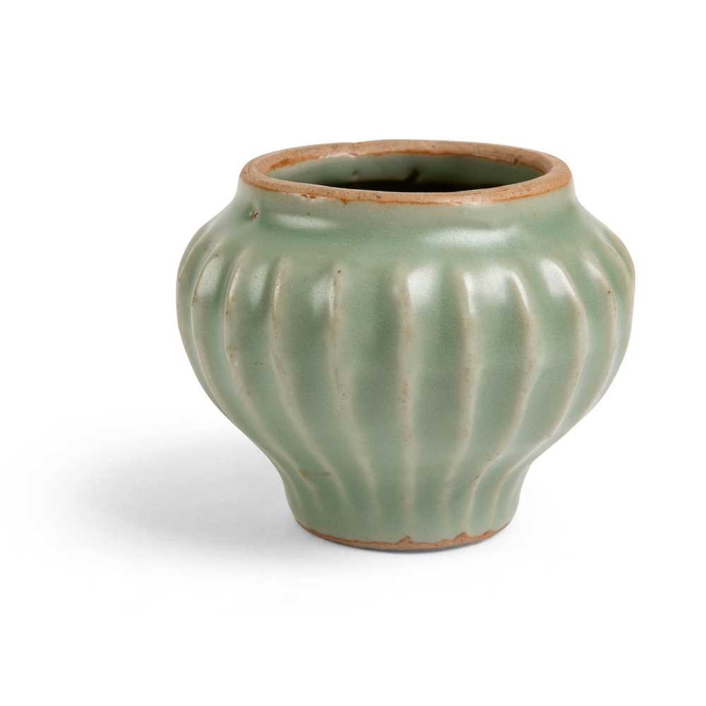 Appraisal: LONGQUAN CELADON JAR YUAN DYNASTY the ribbed broad baluster body