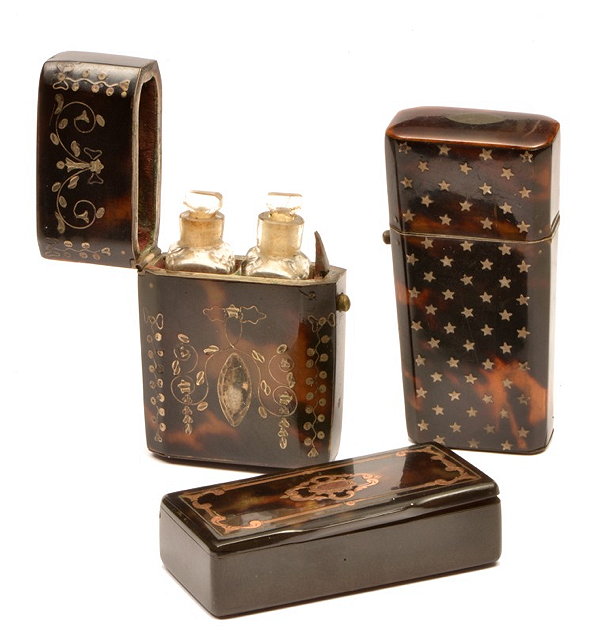 Appraisal: A TORTOISESHELL AND PIQU NEEDLE CASE circa a similar tortoiseshell