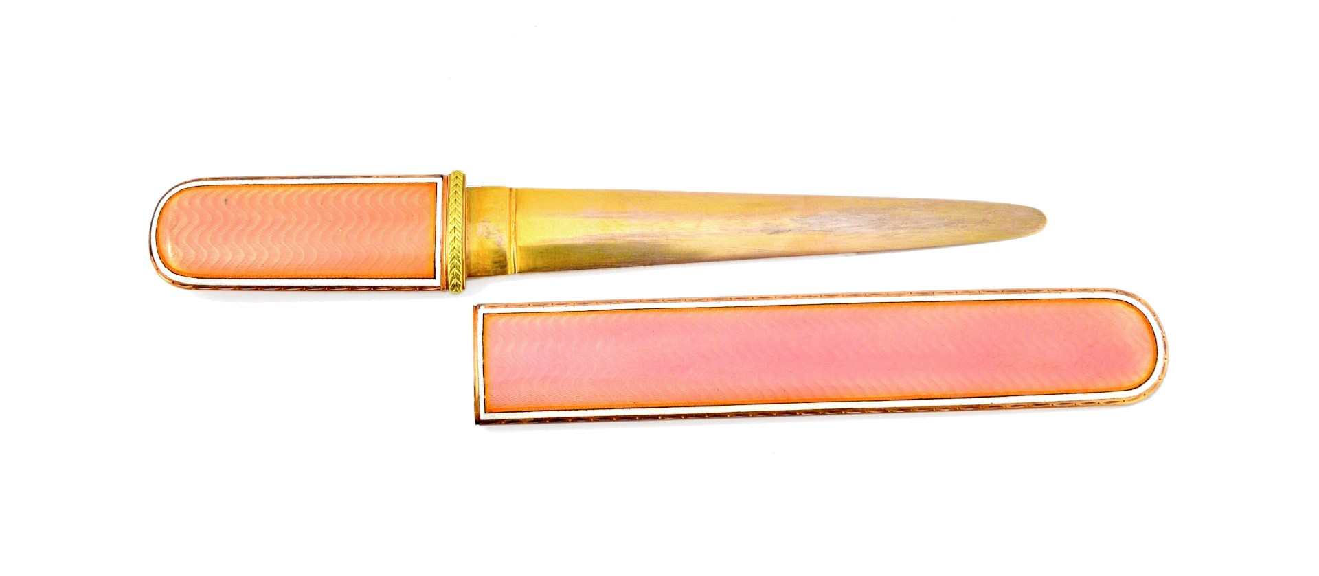 Appraisal: A gold and enamelled paper knife with a tapering blade