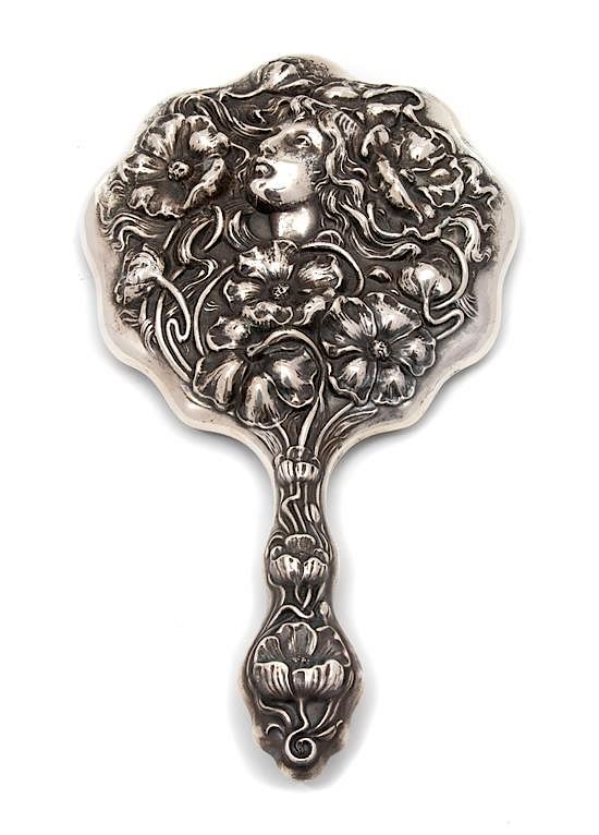 Appraisal: An American Silver Art Nouveau Style Hand Mirror CIRCA An