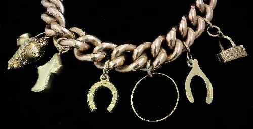 Appraisal: A ct gold hollow link curb bracelet with heart pattern