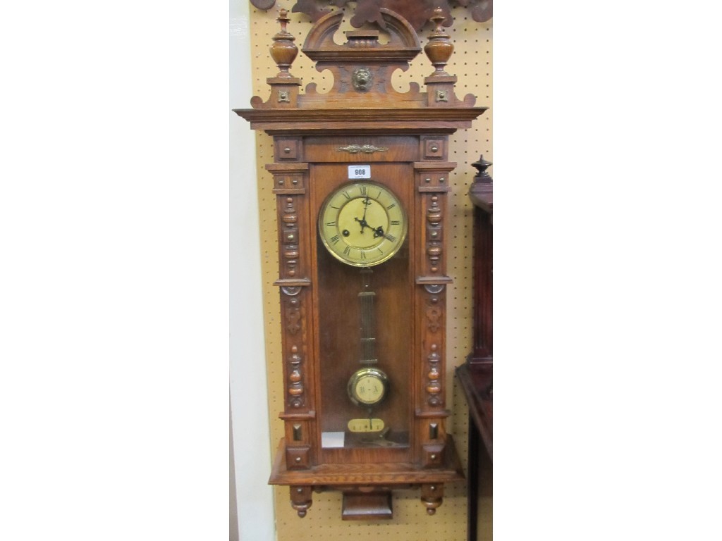 Appraisal: Oak cased Vienna wall clock