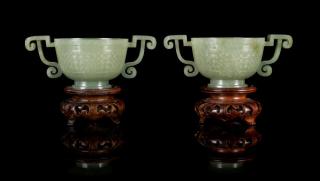 Appraisal: A Pair of Carved Celadon Jade Handled Cups A Pair