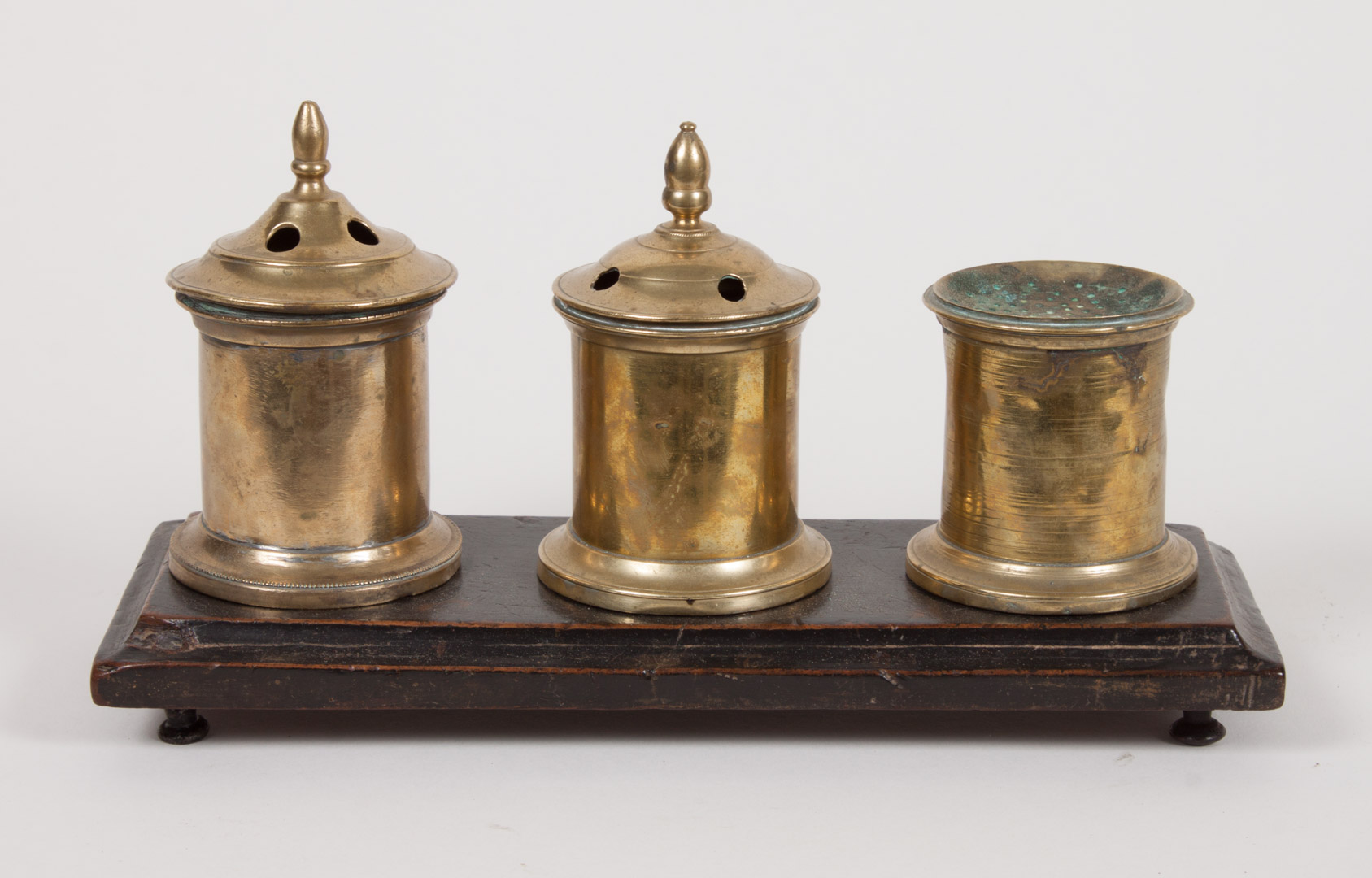 Appraisal: Victorian brass and wood standish circa three brass pots two