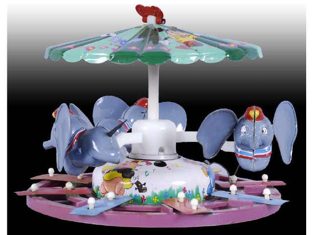 Appraisal: Linemar Japanese Tin Dinsey Dumbo Merry-Go-Round Description Circa Wind-up Working