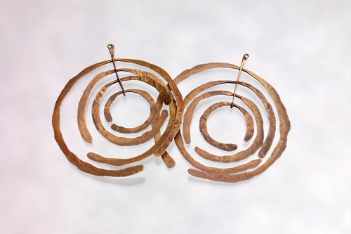 Appraisal: HARRY BERTOIA Pair of hammered and patinated brass earrings designed