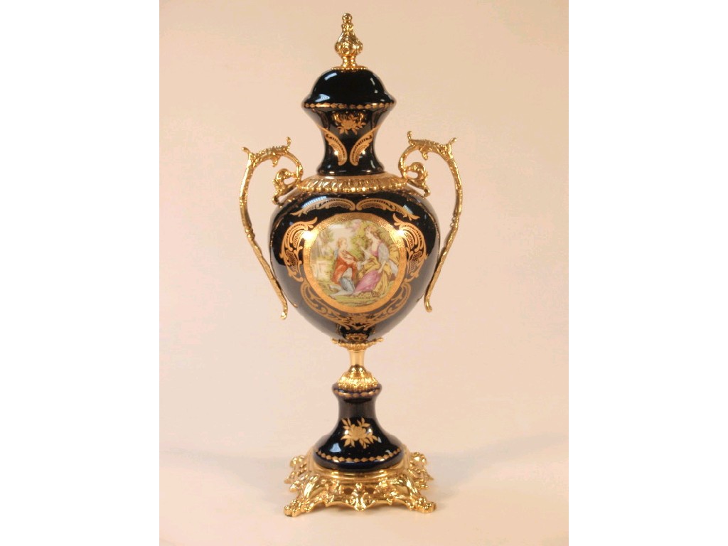 Appraisal: A thC continental ovoid urn and fixed cover with gilt