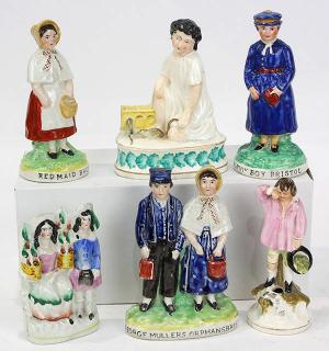 Appraisal: lot of Staffordshire porcelain figural groups of children comprising a