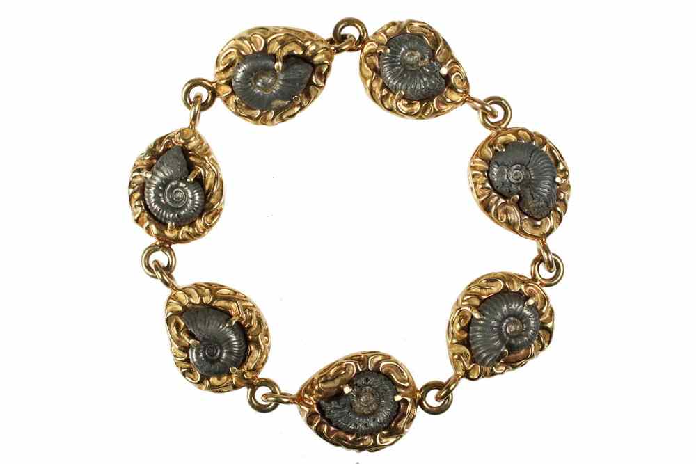 Appraisal: BRACELET - One K yellow molten gold bracelet set with