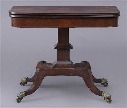 Appraisal: REGENCY MAHOGANY GAMES TABLE The folding swivel top with reeded