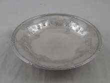 Appraisal: A French silver circular dish with ribbon and thread border