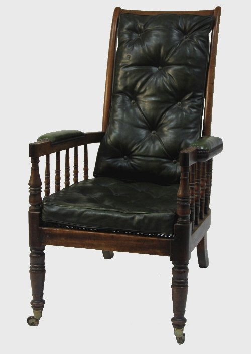 Appraisal: A George IV mahogany spindle back armchair with padded back