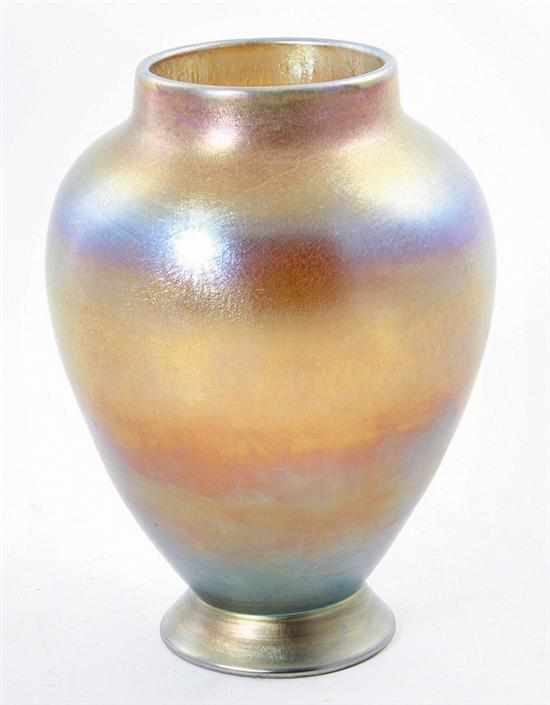 Appraisal: Tiffany style iridescent glass vase ovoid footed form in gold