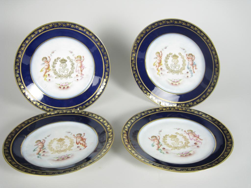 Appraisal: Four Sevres Plates gilt monogram to centre flanked by a