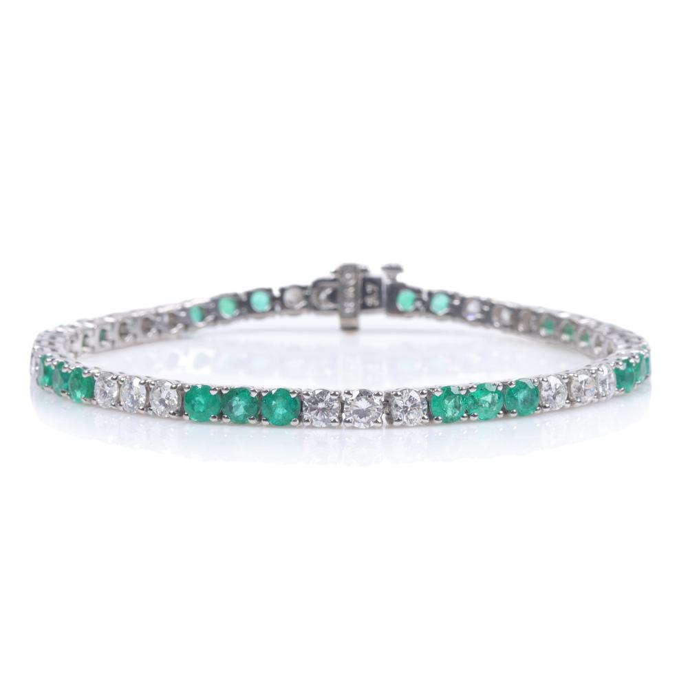 Appraisal: Estate K WG white gold emerald and diamond tennis line