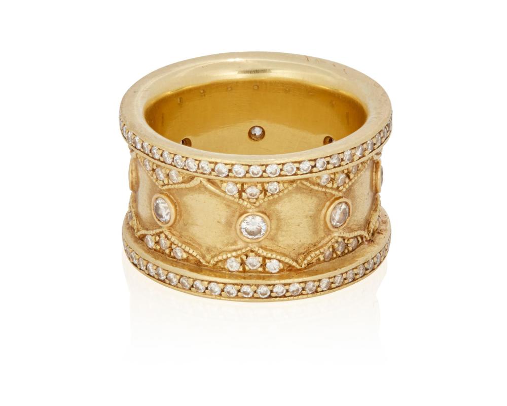 Appraisal: A DIAMOND BANDA diamond band k yellow gold Set with