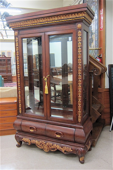 Appraisal: PARCEL-GILT MAHOGANY CHINA CABINET ON STAND French Louis XV design