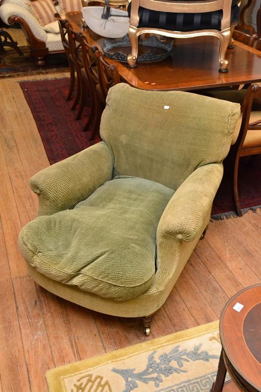 Appraisal: AN EARLY TH CENTURY ARMCHAIR IN GREEN UPHOLSTERY