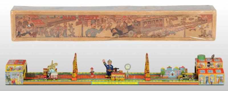 Appraisal: Tin Marx Main Street Wind-Up Toy Description American Circa s