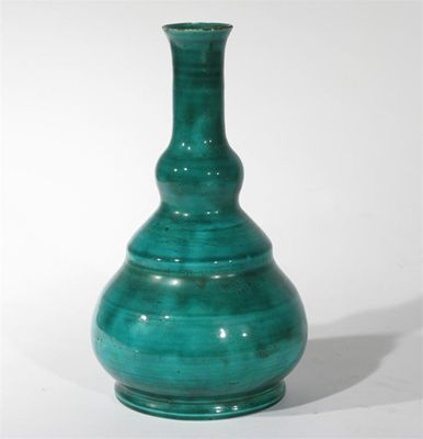 Appraisal: A Bushey Heath Pottery solifleur vase by Fred Passenger shouldered