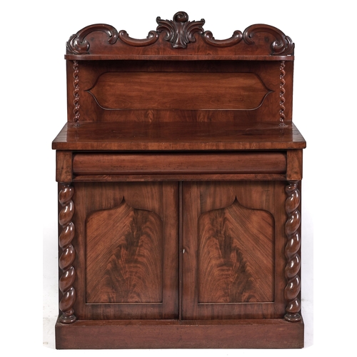 Appraisal: A Victorian mahogany chiffonier with flame figured ogee door panels