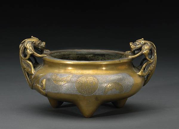 Appraisal: A silver inlaid bronze tripod censer Xuande Mark th Century