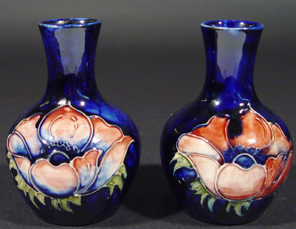 Appraisal: Pair of Moorcroft vases hand painted and tubelined with anenomes