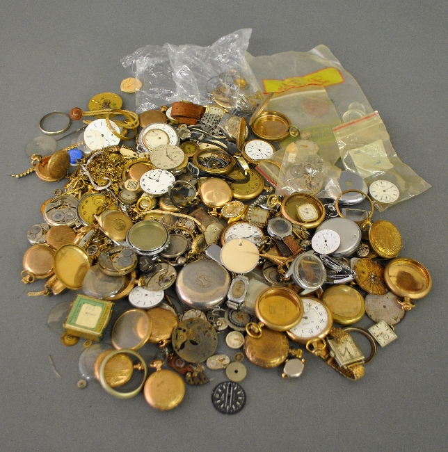 Appraisal: - Large grouping of gold-filled pocket watch parts and pieces