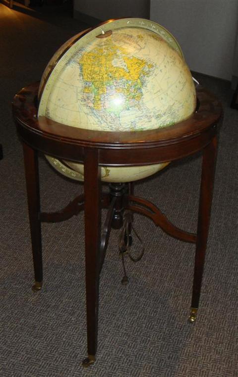 Appraisal: WORLD GLOBE IN MAHOGANY STAND Heirloom Globe by Replogle Electrified