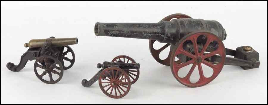 Appraisal: CAST IRON SIGNAL CANNON Together with two smaller cannons Largest