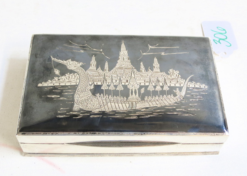 Appraisal: SIAM STERLING SILVER BOX with hinged lid having engraved dragon