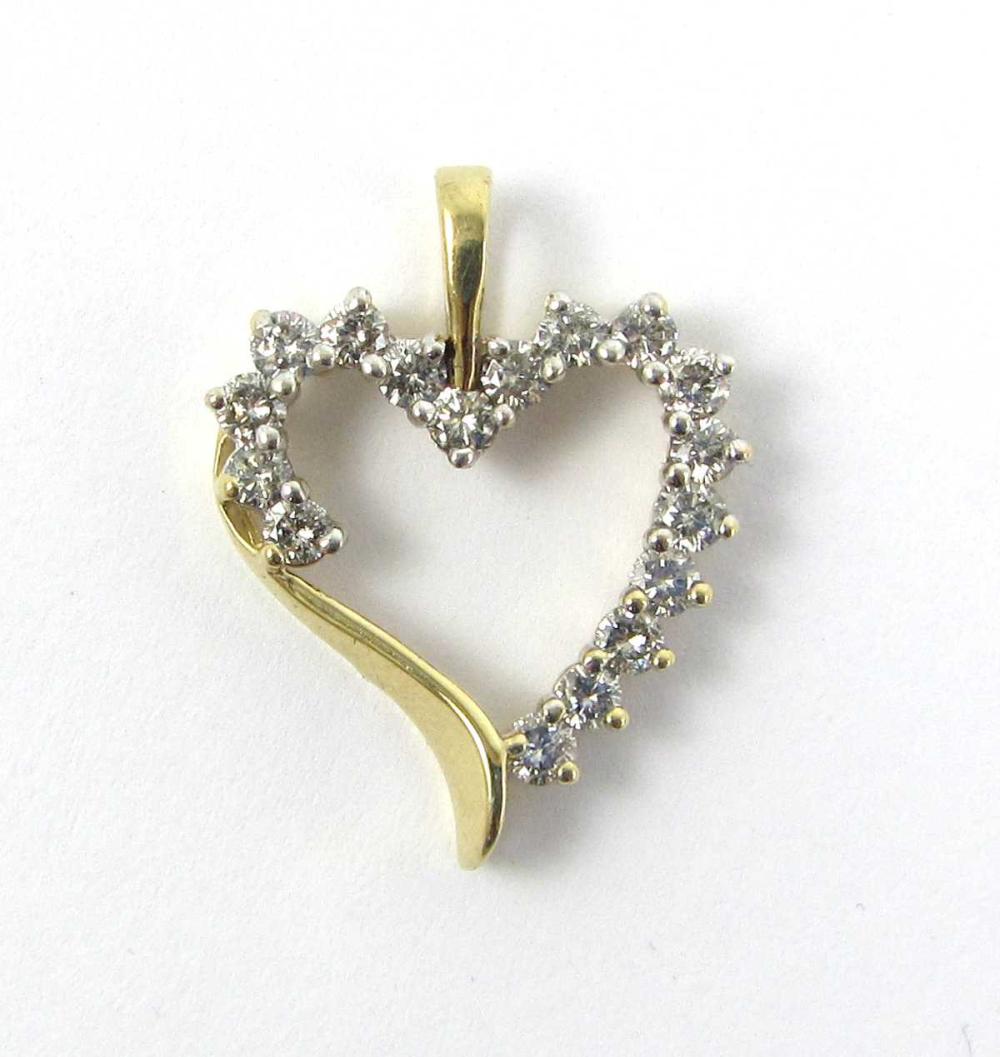 Appraisal: DIAMOND HEART PENDANT Round-cut diamonds total cts K gold length