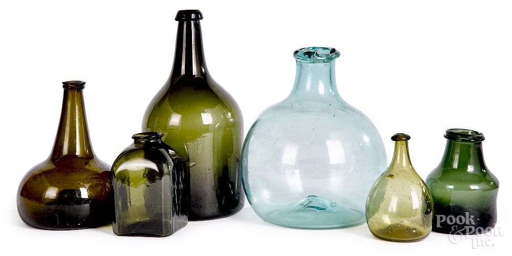 Appraisal: Six blown olive aqua glass bottles Collection of six blown